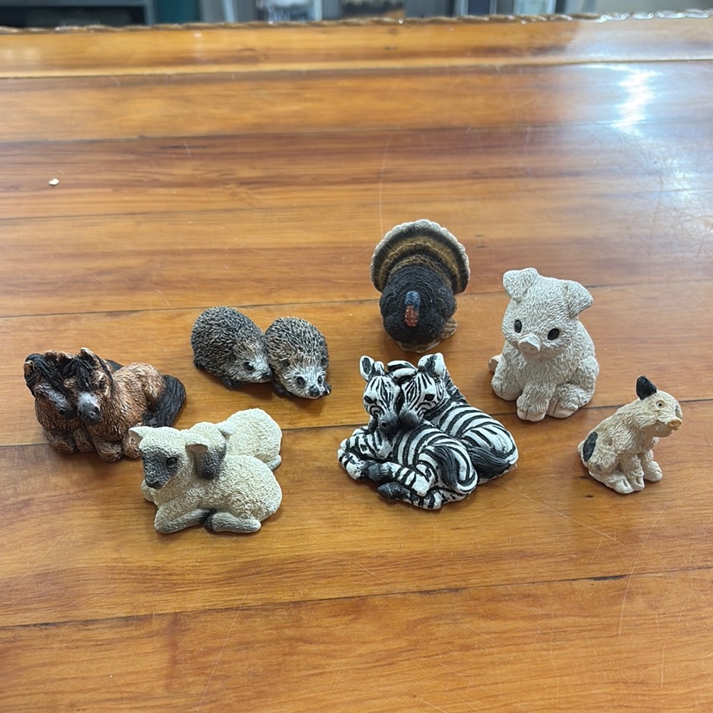 Collection of 7 Stone Critters little, miniature animal figurines.